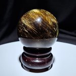 画像1: ☆12/03UP☆月のかけら史上最高峰：ゴールドスモーキールチルクォーツ；コレクションピースを大放出：丸玉加工：金の流星：漆黒の守り（しっこくのまもり） (1)